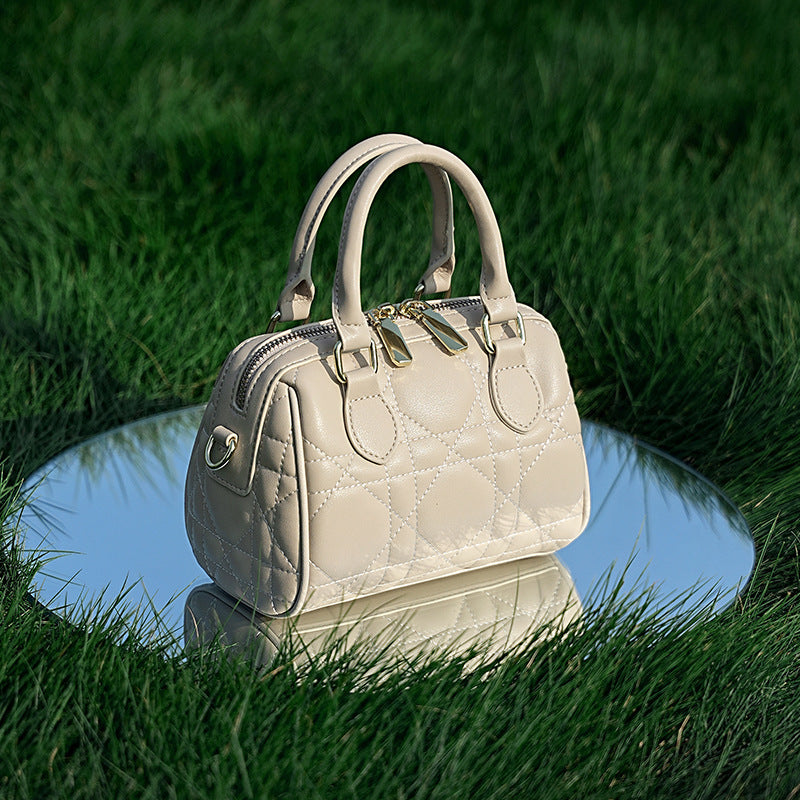 Sac bandoulière Boston en cuir véritable à motif losanges