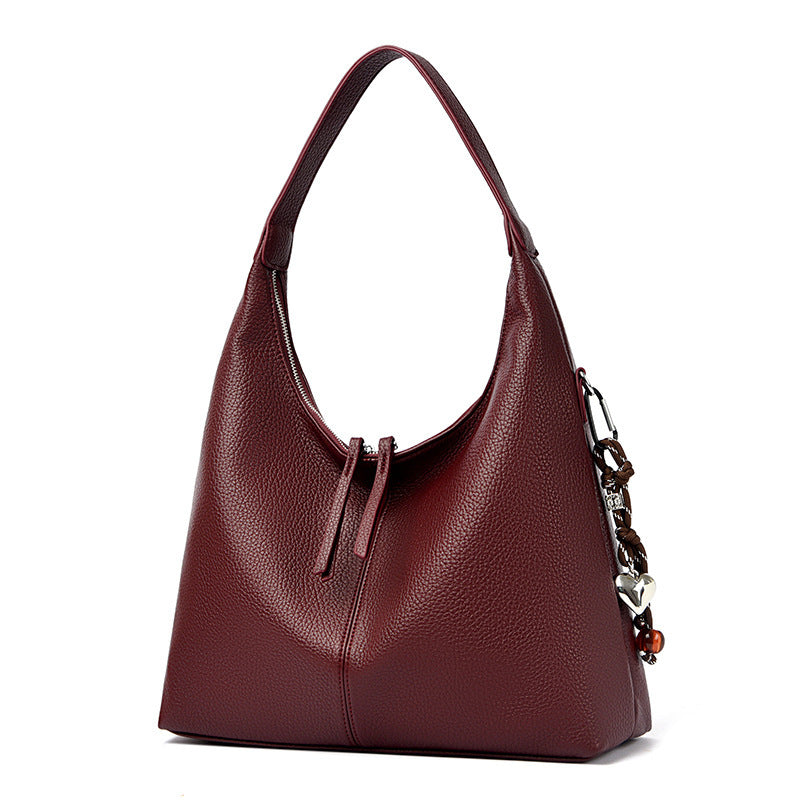 Sac bandoulière élégant en cuir assorti